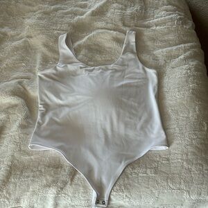 Women’s white scoop neck tank body suit